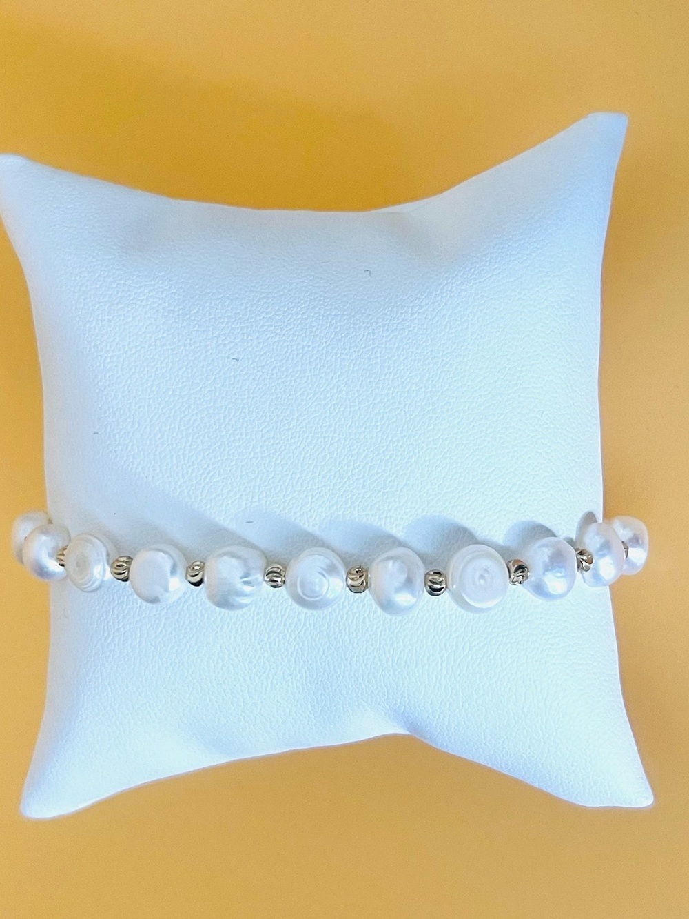 Faux pearls adjustable bracelet gold plated beads plus a clear crystal charm